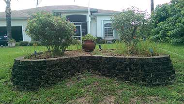 landscaping wall before pressure washing